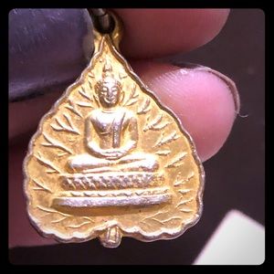 Gold toned Buddha pendant